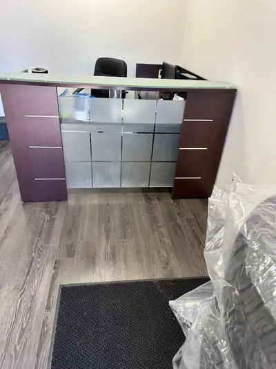 Barely Used , like new Reception desk with glass insert and L return with full pedestal. Used but de...