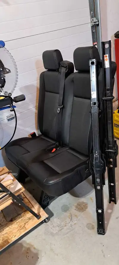 I am selling a used 2 person seat that would be great for a van conversion. The seat is in good cond...
