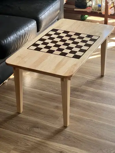 New chessboard coffee table. 36” long by 19” wide by 18” high. Made from solid Canadian Maple, the d...