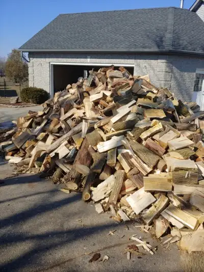 Firewood - dry -Cherry, maple, hickory, and ash wood -$25/wheelbarrow -$90/face cord -delivery avail...