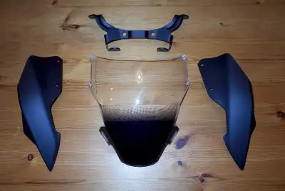 Ducati Monster Motorcycle Dark Headlight Fairing Set – New in Box Ducati part # 97180391A – List pri...
