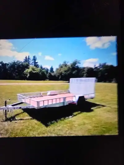 Galvanized 83" x 14' with left or right side ramp access & mesh ramp tailgate in excellent condition...