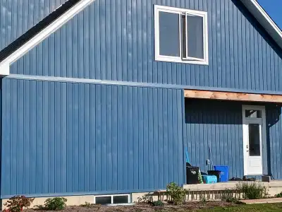 blue vinyl board and batten siding , View more