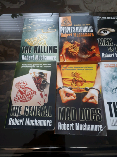 Lot of 13 paperback & 1 hardcover books by rober muchamore, View more