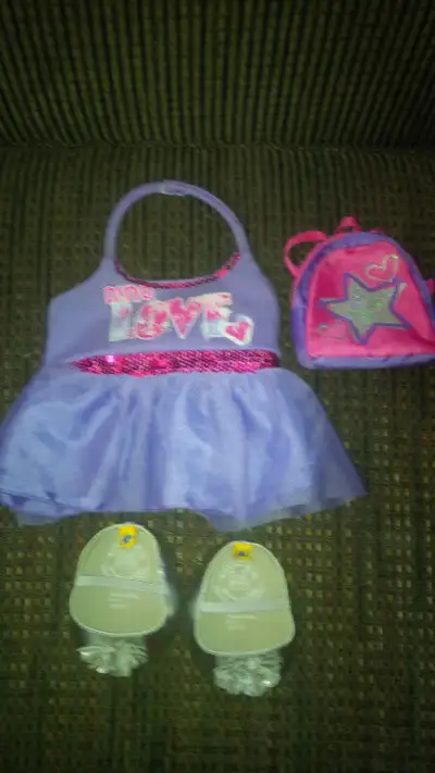 Selling a Build a Bear clothing set. In excellent brand new condition. Includes Dino Love velcro dre...