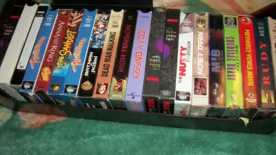 ** Several boxes of tapes, kids, family, adult movies, short demo tapes that can be cleared and reco...