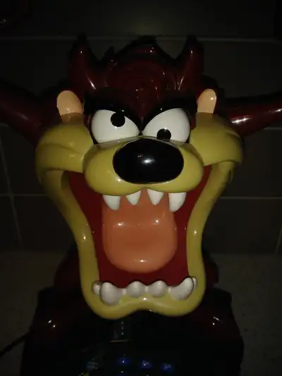 TASMANIAN DEVIL ANIMATED LANDLINE TELEPHONE TELEMANIA TAZ ROLLS HIS EYES WHILE WAVING HIS ARMS AROUN...