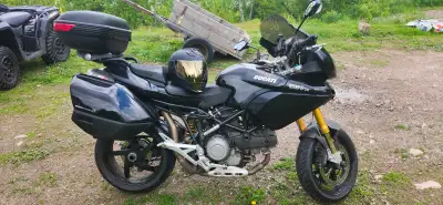Runs excellent bodys good shape ohlin suspension brembo brakes 40k on it, luggage racks. No trades f...