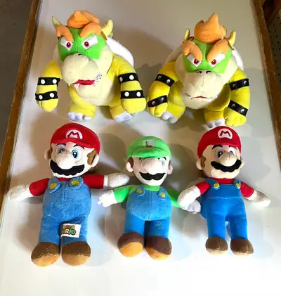 Nintendo Super Mario Brothers Plush! Up for grabs are two Bowsers, two Mario’s and a Luigi plush. Th...