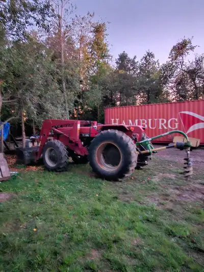 4x4 loader tractor All New fluids New front tires everything works perfect 3 point hitch with pto Ne...