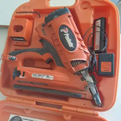 paslode framing nailer two battery one charger and 2 full cases of framing nails including two gas c...