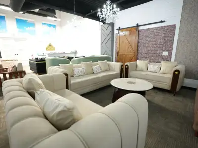 This luxury 7-seater sofa set with a center table is designed to elevate any living space, featuring...