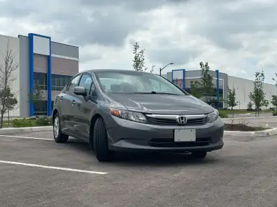 2012 Honda Civic LX A/T Clean Title 159,XXX Km, drives great, Located 410 and Bovaird in Brampton —...