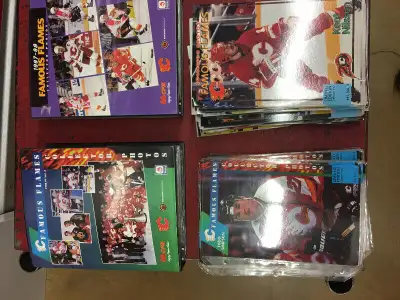 Several Husky Calgary Flames photo cards and 2 binders.(97/98 and 98/99)$35 obo (Please see my other...