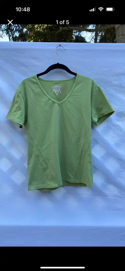 Excellent condition, just the brand name is cracking Size large Light green color Stretchy Pit to pi...