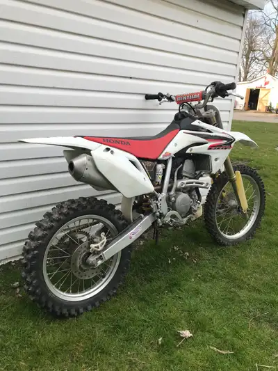 2008 Honda crf150rb. Comes with extra red plastics. Ready to ride . $3000obo
