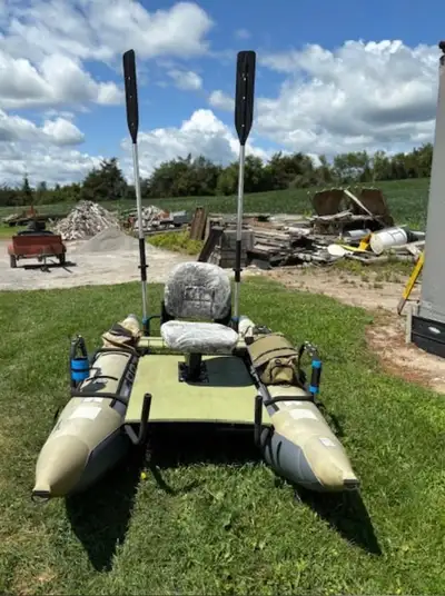 Pontoon Fishing Boat, in great shape. Able to fit in back of 1/2 ton truck. You will need pump to in...