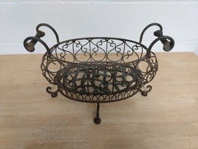 Vintage artisanal handmade metal basket., View more