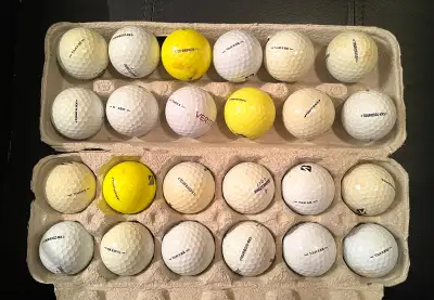  Two dozen Bridgestone tour golf balls in fair condition