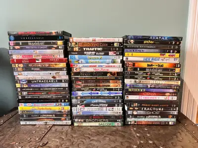 66 (if I counted right) DVD movies Selling as a lot for 35$ please Cash pick up is preferred please....