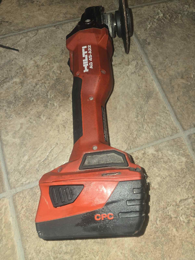HILTI AG -A22 angle grinder  plus 2 batteries 18v in Power Tools in Saskatoon