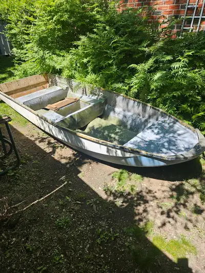 12 foot fiberglass boat Good shape, no leaks No trades