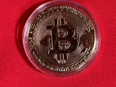 This is a brand new Bitcoin collectible coin, perfect for enthusiasts or as a unique gift. It's a gr...