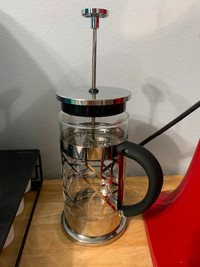 Machine à café avec poussoir