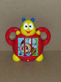 Pilas Musical Bug Toy with Movable Puzzle Front : Like New