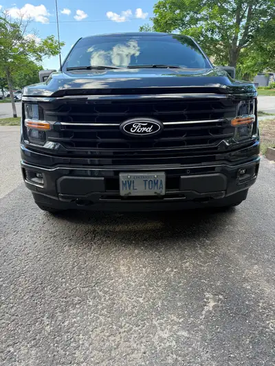 This 2025 Ford F150 XLT 4WD features a powerful engine and rugged 4x4 capability, perfect for both w...