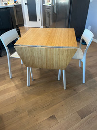 IKEA table and chairs (x2) with leaf extension. 