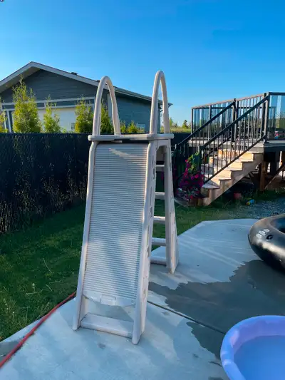 Roll guard A-frame safety ladder for above ground pool. Like new condition. Used for only one pool s...