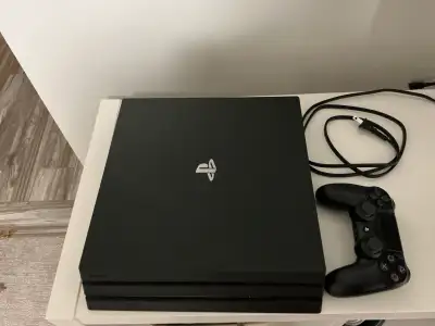 Sony PlayStation 4 with controller, View more