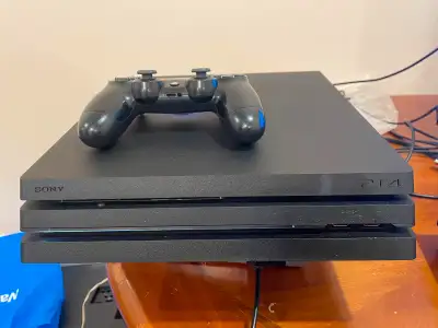 PS4 Pro 1TB with three games, View more