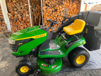Johndeere lawn tractor 10 hrs. Like new extra blades and bagger