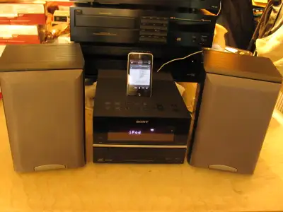 Great for a smaller room or someone that is limited for space. It features an iPod dock, working CD...