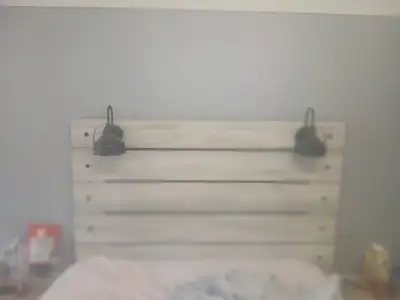 1 dresser and a headbord with 2 lights for sale bought at ashley furniture asking 250 long dressrr s...