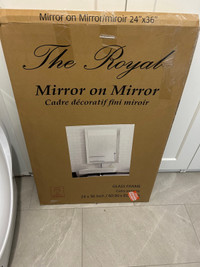 Beveled mirror with black side panels 