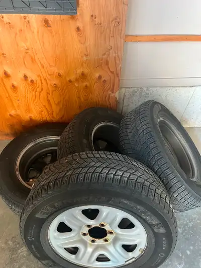 Michelin X - Ice snow tires on rims 275/65 R18 Used three winters on Toyota Tundra $350 for all 4