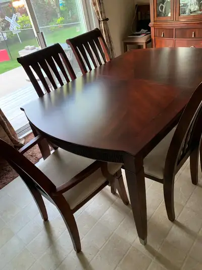Real wood construction Table - 66”x42” plus one extra leaf Arm chairs x 2 Chairs x 4 China cabinet -...