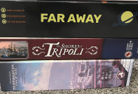 Assorted used and new board games, various prices