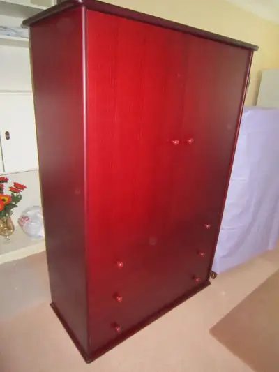 This armoire/wardrobe is beautiful , roomy and practical. Comes with two shelves and three drawers....