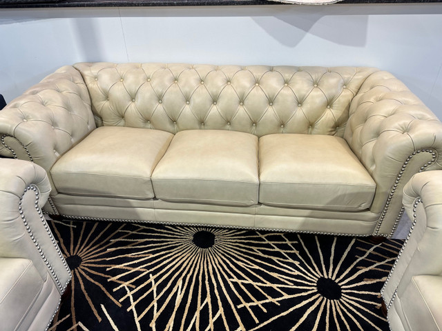 Cream tufted leather chesterfield sofa  in Couches & Futons in Winnipeg
