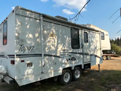 25foot 2002 topaz LE In excellent used condition everything works has new tires and a rear tow hitch...
