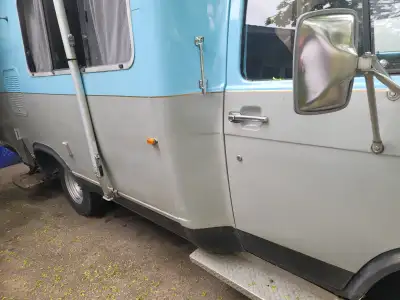 The 350 Chevy converted by Winnebago this vintage RV rides nice and easy. the interior was refurbish...