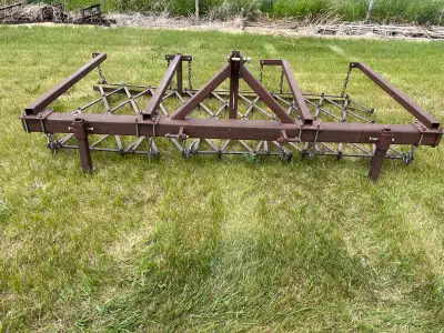 9’ harrows for a cat 1 tractor. Used for leveling mole hills. Comes with stands