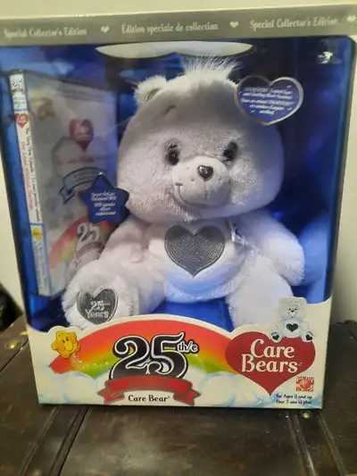 25th Anniversary limited edition Care Bear and Cabbage patch doll. Boxes never been opened but do ha...