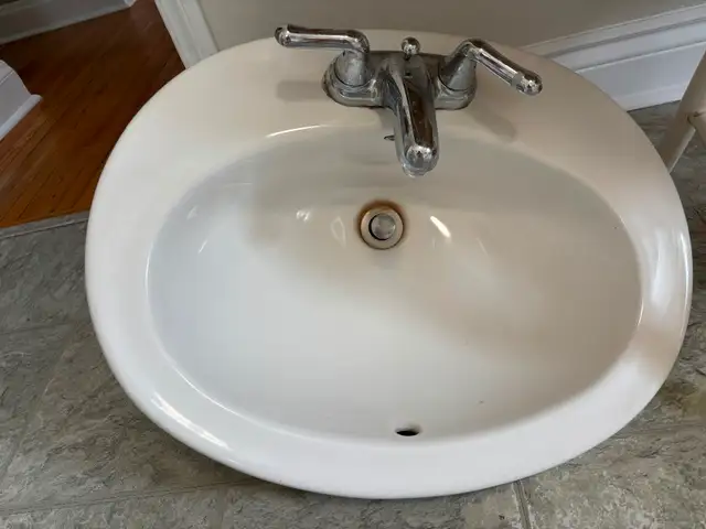 Bathroom sink with faucet