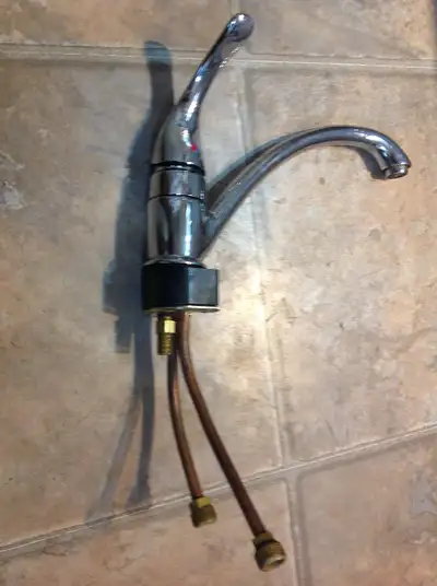 single leaver Moen chrome finish faucet, View more