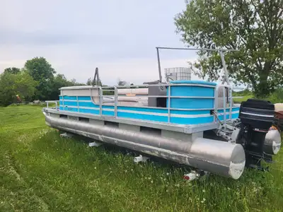 Boat motor and trailer. Completely sound. Good floor. Trailer is in very good condition. Engine runs...